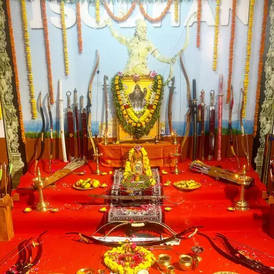 The altar for the Ayudha Puja at our Gurukulam in Tirupati. Bows, swords, and arrows are arranged and offered flowers and prayers, honoring them as sacred instruments of this Vedic art.