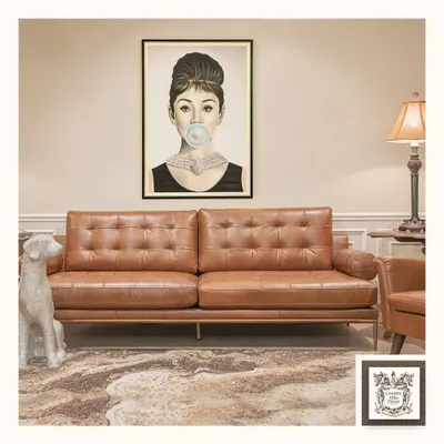 This iconic Audrey Hepburn print adds a touch of playful chic to a modern living room. Paired with a classic mid-century leather sofa, it creates a stylish, eclectic look that bridges timeless glamour and contemporary design.