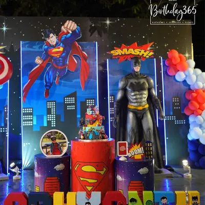 We created a power-packed superhero bash with life-sized statues of Superman and Batman. The setup included a city-at-night backdrop and custom-themed pedestals, perfect for a young hero's celebration.