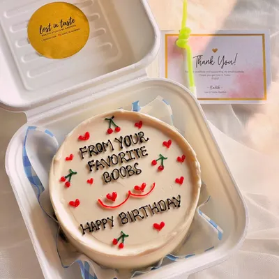 A fun and cheeky birthday message cake. This design shows how we can use playful text and simple cherry and heart illustrations to create a memorable and personal gift.