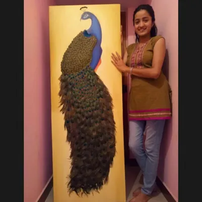 This custom peacock painting is one of my favorite large-scale commissions. I used real texture for the feathers to create a three-dimensional effect, making the artwork feel alive. This kind of statement piece is designed to be the focal point of a room.