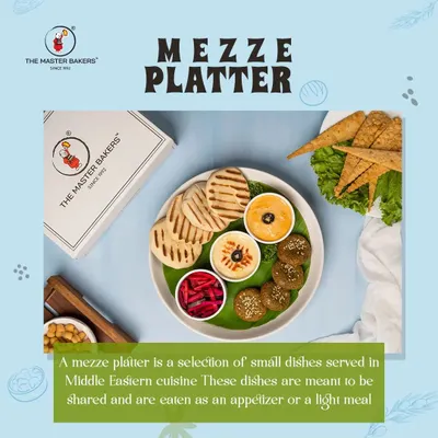 Our Mediterranean Mezze Platter is perfect for sharing. It includes crispy falafel, creamy hummus, a tangy dip, pickled vegetables, and warm grilled pita bread, offering a variety of flavors and textures.
