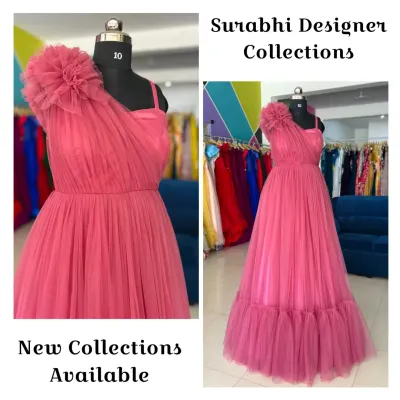 A new addition to my collection, this pink one-shoulder tulle gown features a large floral detail. It's a perfect rental for proms, parties, or photoshoots.