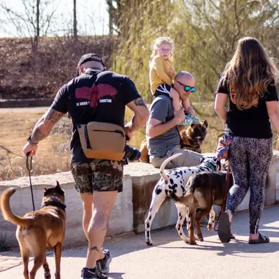 The whole family is welcome on our pack walks! It's a great way for everyone to get involved in the dog's training and enjoy a nice walk together.