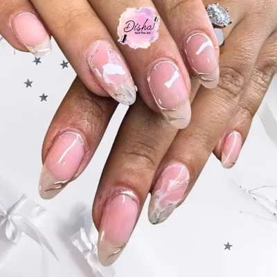 The elegance of white. This design features a milky pink base with abstract white marble and delicate silver line details.