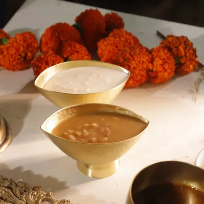 Ada and Palada, the two sweet crowns of any Sadya. Served in traditional brass bowls, these payasams represent the final, blissful bites of the feast. One is jaggery-based, the other milk-based, but both are divine.