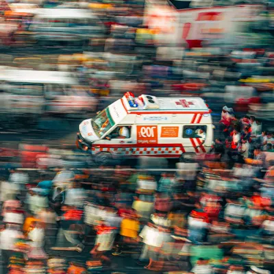 Capturing the chaos and devotion of the Rath Yatra in Puri. This motion blur shot of an ambulance cutting through the crowd tells a powerful story.