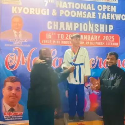 A proud moment at the 7th Open National Taekwondo Championship in Lucknow. My student stands on the podium, receiving his medal after a tough competition.