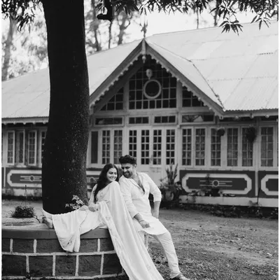 A beautiful, serene moment at the Citadel Resort in Panchgani. The classic architecture of the heritage building provides a stunning backdrop for this timeless black and white portrait.