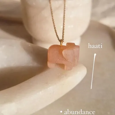 My 'haati' elephant pendant, hand-carved from peach moonstone. This charm is for abundance and luck, and I especially recommend it for those who feel unlucky in love.