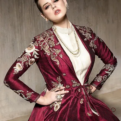 This powerful pose perfectly complements the modern, structured design of the embroidered maroon jacket. It's a great example of how I shoot fusion wear to feel both traditional and contemporary.