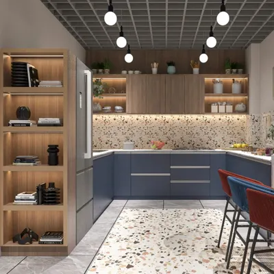 This modern kitchen design for an office pantry combines bold blue cabinets with a playful terrazzo backsplash and floor inlay. The open shelving and industrial-style grid ceiling add a contemporary, stylish touch.