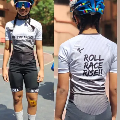 Our new academy body suit, seen from the front and back. The "Roll, Race, Rise" motto on the back is what we're all about.