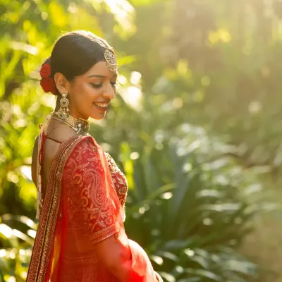 A beautiful, sun-kissed portrait of the bride. I work with photographers to capture these serene moments amidst the wedding hustle.