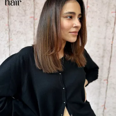 Lux brunettes in a chic, shoulder-length cut. This style is timeless and sophisticated, with subtle layers to add movement and a healthy, straight finish.