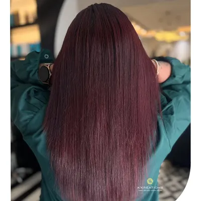 A bold and glossy fiery red hair color. I ensure that even the most vibrant color transformations leave the hair feeling soft and looking incredibly shiny.