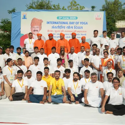 A group photo with participants and organizers at an International Day of Yoga event. It takes a community to create such successful events, and I am thankful for everyone's support.