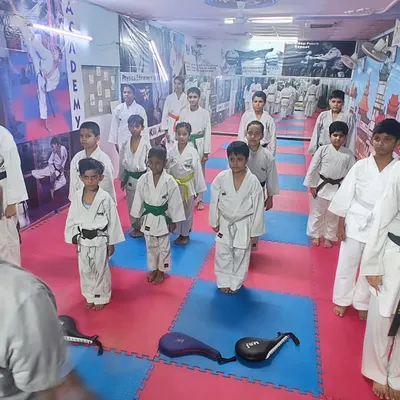 Students standing in formation during a class at the Open National Karate Championships, showing the discipline we instill.