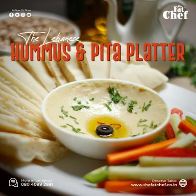 The star of any platter: my Lebanese Hummus & Pita. This is my personal recipe for authentic, smooth hummus, finished with a generous drizzle of good olive oil. It's simple, healthy, and always a crowd-pleaser.