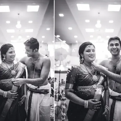 A happy, candid moment between an expecting couple during their baby shower ceremony. We love capturing these genuine smiles in timeless black and white.