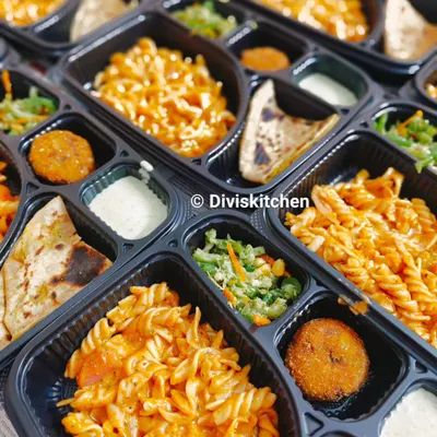This party box was for a child's birthday party, and it was so much fun to put together. It features my creamy red sauce pasta, veg cutlets, a fresh broccoli salad, and soft aloo parathas with a yogurt dip. I can create custom meal boxes like this for any event.