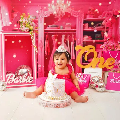 A full view of our delightful Barbie-themed first birthday setup. We create an entire world for your little one to celebrate in, making their cake smash session truly magical.
