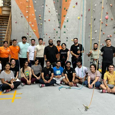 This is what a successful team outing looks like. I bring colleagues together for a day of climbing, problem-solving, and bonding that translates back to the workplace.
