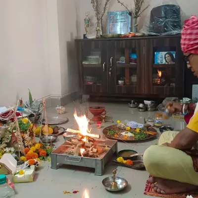 The ceremony fire and offerings appear at our new office puja on 23 May 2024, marking an office-opening milestone.