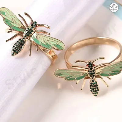 This unique, bee-shaped napkin ring is the perfect finishing touch to any tablescape. It complements both casual and formal parties, adding a touch of whimsy and elegance.