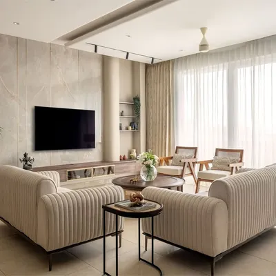 This living room from the Muted Muse series is a story told in textures. I layered cane, natural wood, soft linens, and stone to create a tactile, warm, and organic space that invites you to connect with your surroundings.
