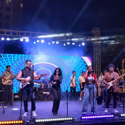 A smashing show with the Moksha All Stars on a big outdoor stage. You can see the full band setup and the energy we bring to large events, complete with backing vocalists and a dynamic stage presence.