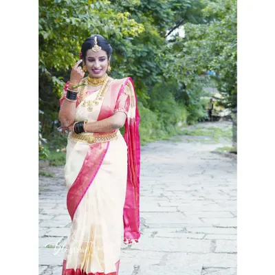This was my own muhurtham look. I draped my wedding saree myself, focusing on a traditional and secure style that would last through the long ceremony. This experience is what inspired me to help other brides.