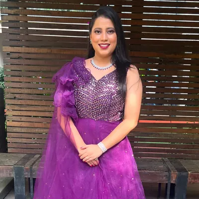 A glamorous look for an evening event. My client is wearing a stunning purple gown, and I created a makeup look with a bold lip and defined eyes to match.