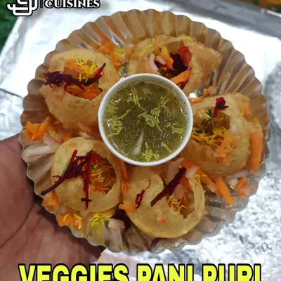Introducing my Veggies Pani Puri, a first in Bangalore! I load up the classic puri with finely chopped fresh vegetables for a healthier and crunchier bite.