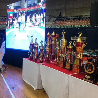 A display of trophies from a JKA tournament. These awards represent the culmination of countless hours of dedicated training and the competitive spirit of our karateka.