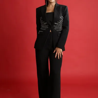 A few of my favorite shots from a professional photoshoot. A sharp, embellished blazer is a power look that works perfectly for a modern corporate event.