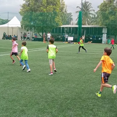 An intense moment from a football match at one of our turf parties. Kids get to experience real teamwork and sportsmanship.