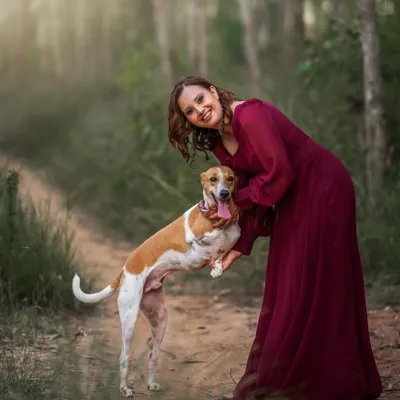 This one is for all the dog mothers out there. This beautiful outdoor portrait captures the loving, gentle connection between a woman and her beloved pet.