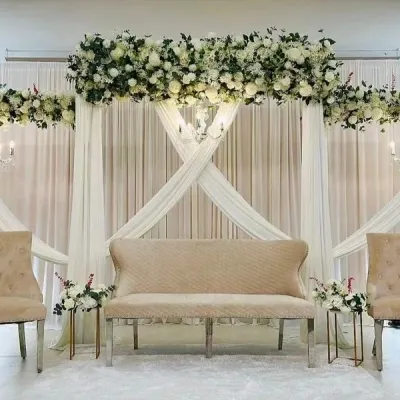 I specialize in creating elegant and sophisticated stage environments. This clean, modern setup features premium seating, soft drapery, and classic chandeliers, perfect for award ceremonies, corporate galas, or formal receptions.