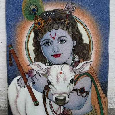 This painting of a young Krishna with a calf is a personal favorite, capturing his compassionate nature. The use of gemstones adds a unique texture and light, reflecting the divine innocence of his Bal Krishna form.