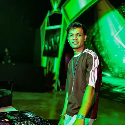 A smile for the camera before I get back to the mix. This is my office, and I love my job.