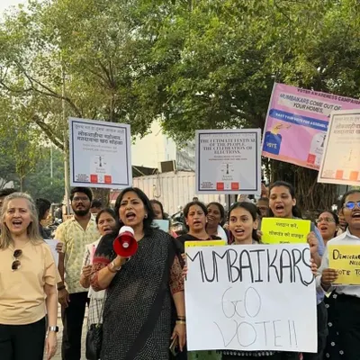 Leading a voter awareness campaign with a megaphone in hand. We must be loud and clear in our message: "Mumbaikars, Go Vote!". It is our collective responsibility to strengthen democracy by participating in it.