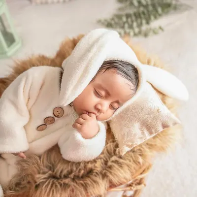 To the most adorable bunny ever. I have a collection of sweet, soft outfits like this one to make your newborn's photos extra cute.