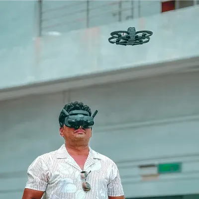This is me in my element, flying my FPV drone in Penang, Malaysia. Being a certified pilot means I can operate legally and safely, whether I'm capturing a massive festival in India or exploring a new city abroad.