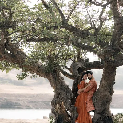For actor Tanuj Virwani and Tanya Jacob's pre-wedding shoot in Lonavala, we found this incredible ancient tree. It served as a powerful, natural frame, symbolizing deep-rooted love and a journey that's just beginning.