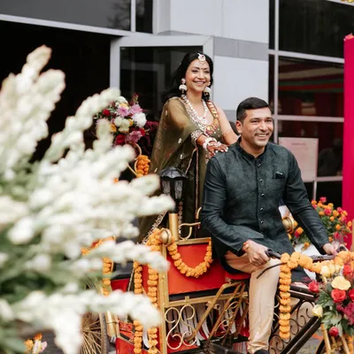 The pure joy on the couple's faces during their fun Mehendi entrance is what it's all about. We love creating these happy memories.