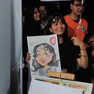 The pure joy on her face says everything. This is why I love being a caricature artist.