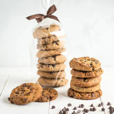 My classic chocolate chip cookies, stacked and ready to be enjoyed. Made with premium chocolate, these cookies are a timeless comfort treat, perfect for any time of day.