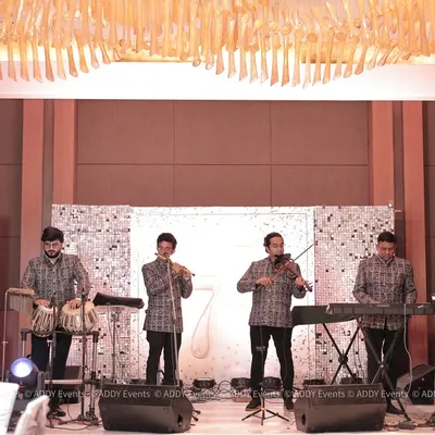 We can arrange for exceptional live entertainment to elevate your event. This instrumental band, featuring musicians on the tabla, flute, violin, and keyboard, provided a soulful and elegant musical experience for a milestone celebration.