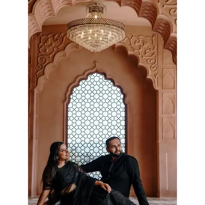 A stunning pre-wedding shoot with a majestic backdrop. I created a timeless and elegant makeup look for the bride-to-be that complemented their all-black, coordinated outfits.